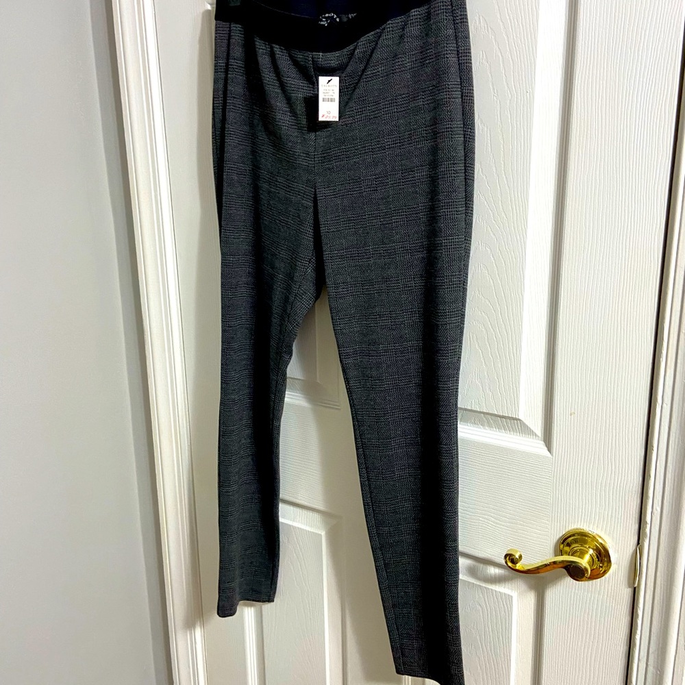 NWT. Gray/black plaid leggings. Very comfortable.